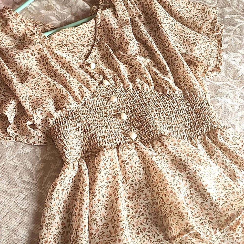 Jr's floral blouse